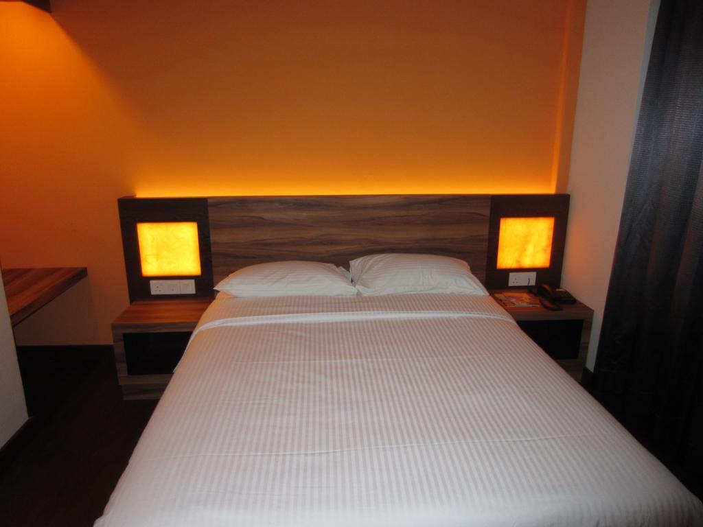 Waterfront Boutique Hotel Port Dickson Quarto foto